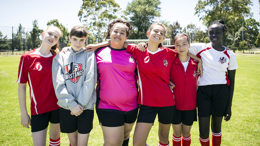 Girls Kicking Goals in Mustangs FC